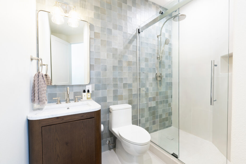 bathroom remodel blue tile wall wood vanity san diego
